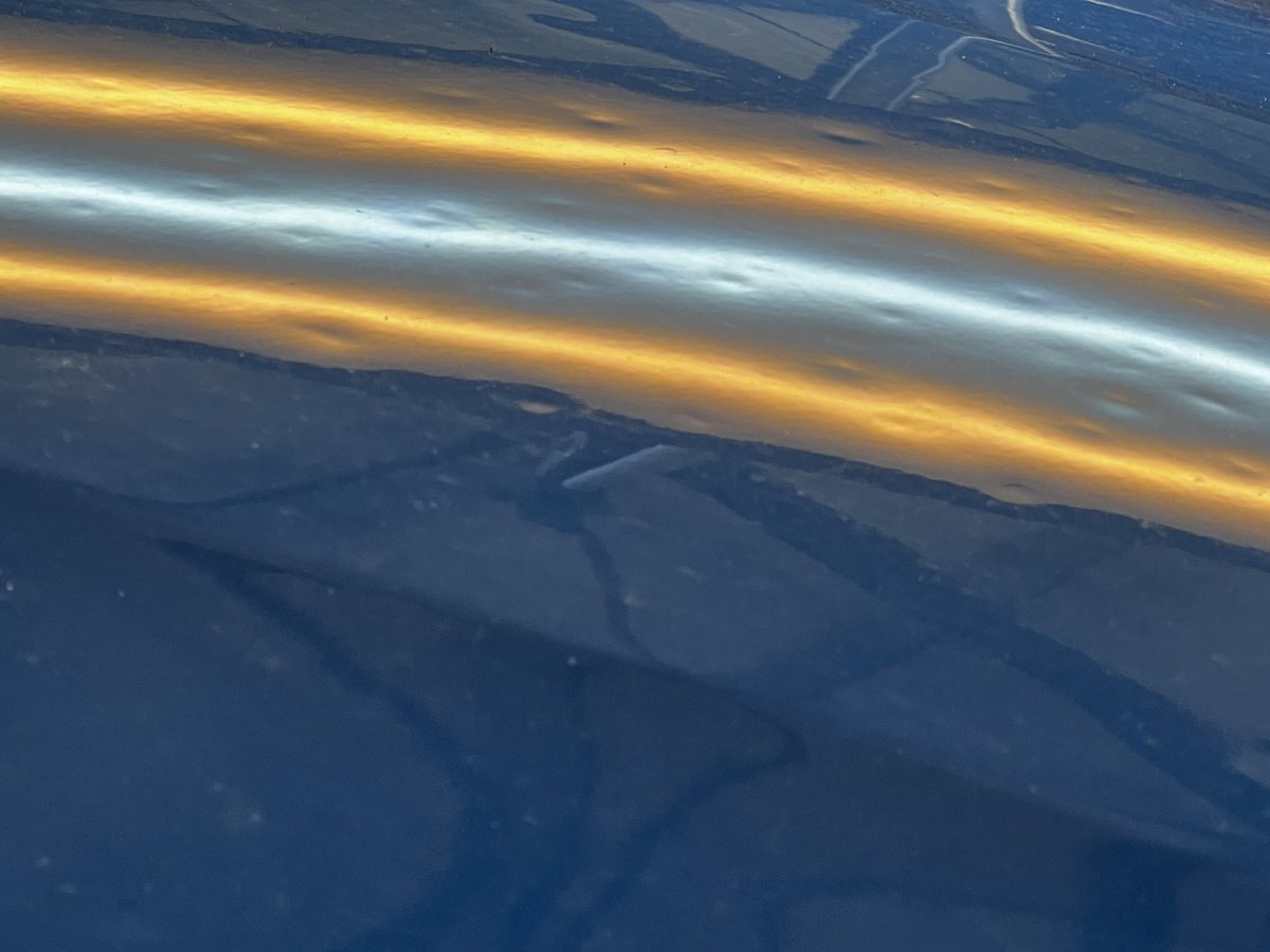 Bonnet Dents — dent before repair
